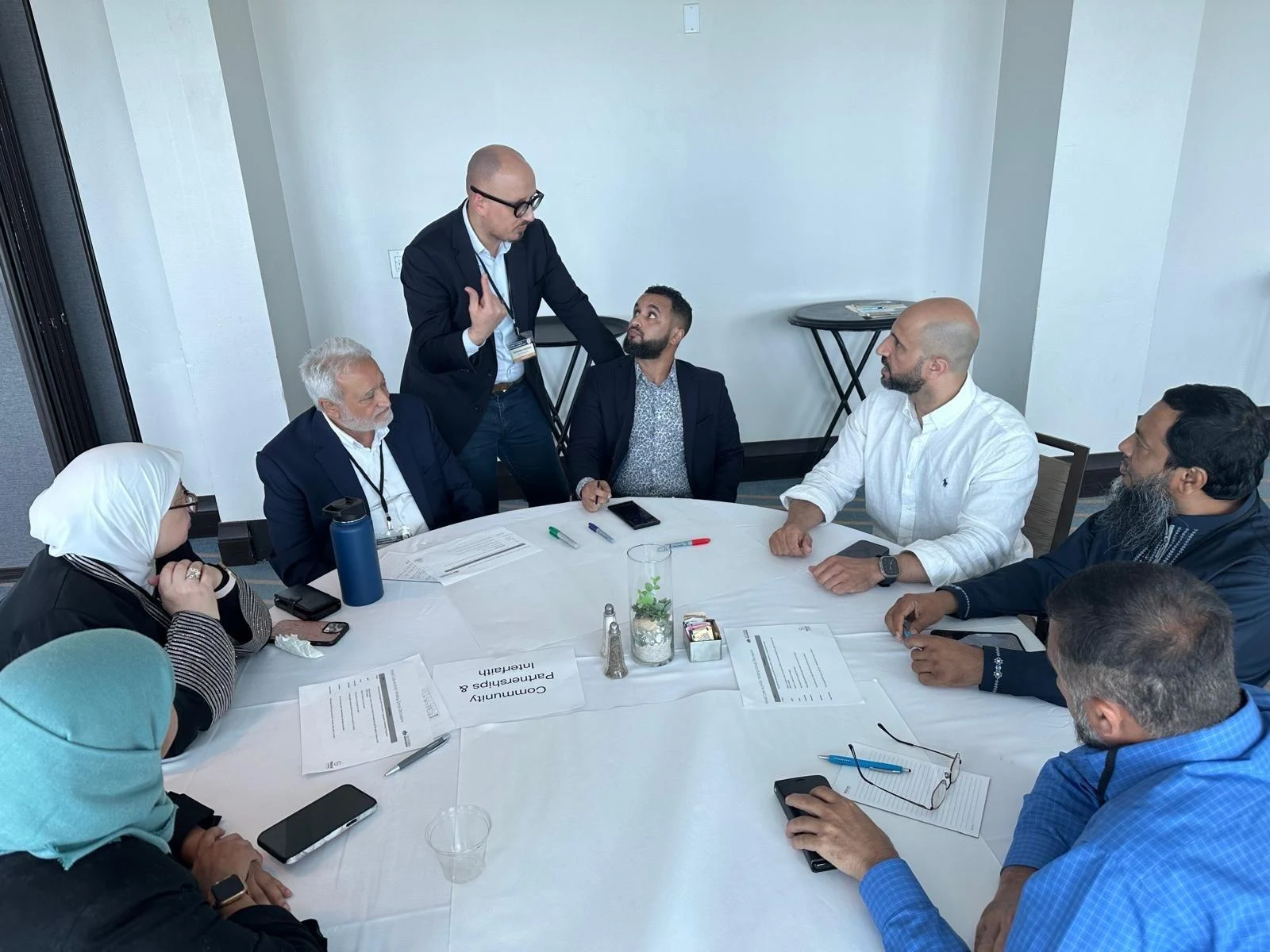 Board members engaged in a round table governance discussion